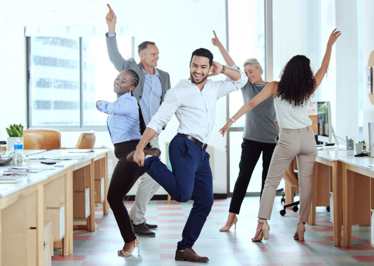 showing-off-his-moves-shot-of-a-group-of-business-2022-08-26-12-00-15-utc